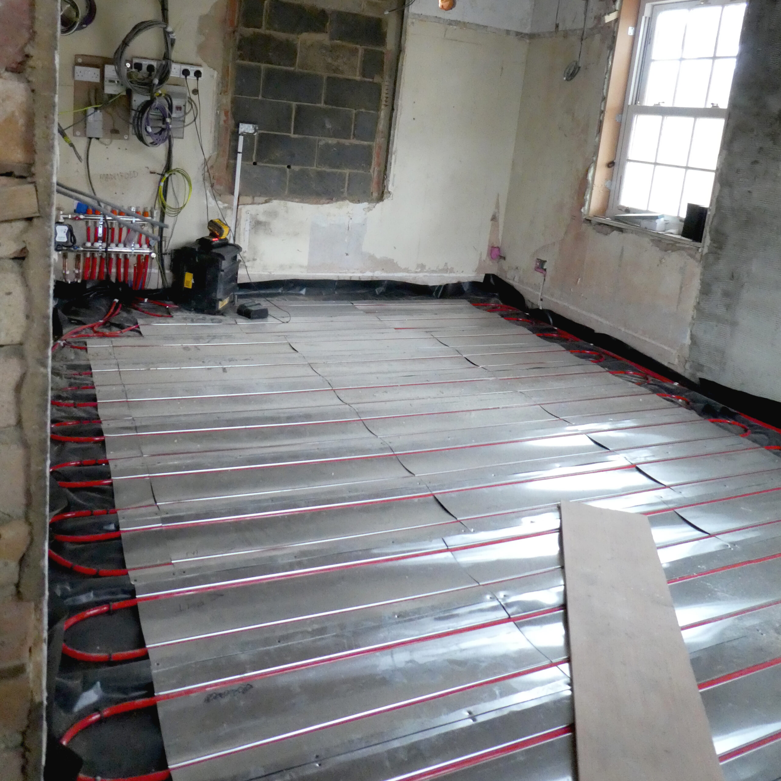 UFH trays on an insulated suspended timber floor